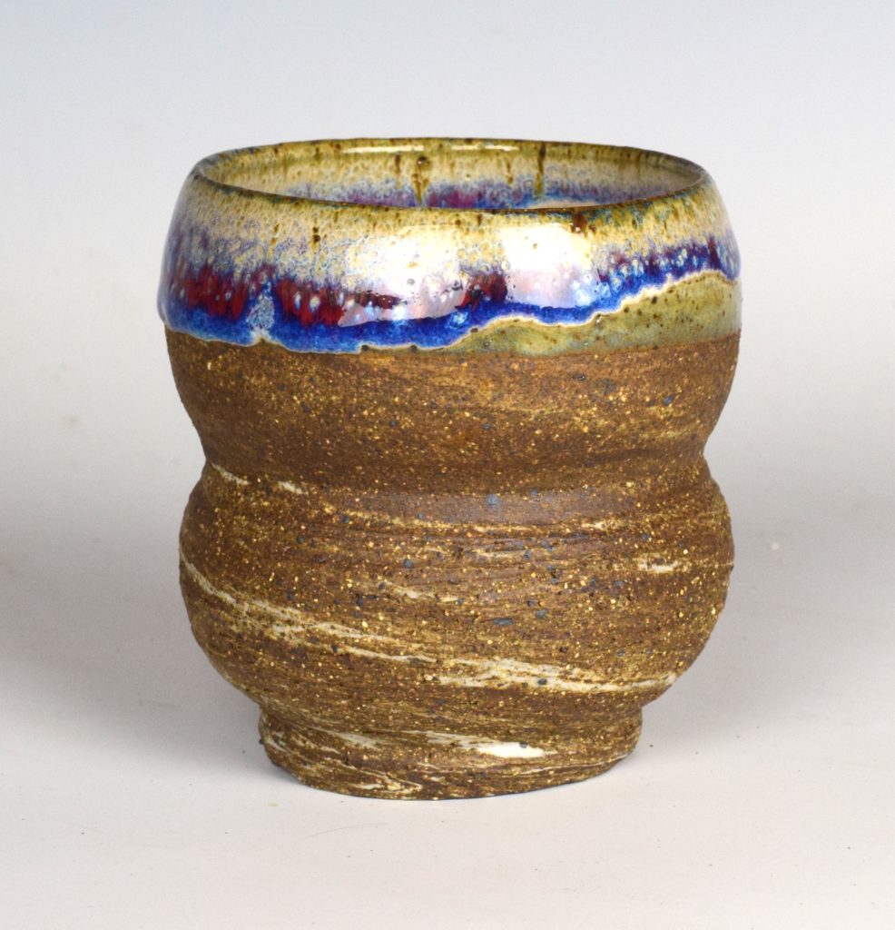 dark stoneware, drippy glazes, rustic rainbow drip tumblers